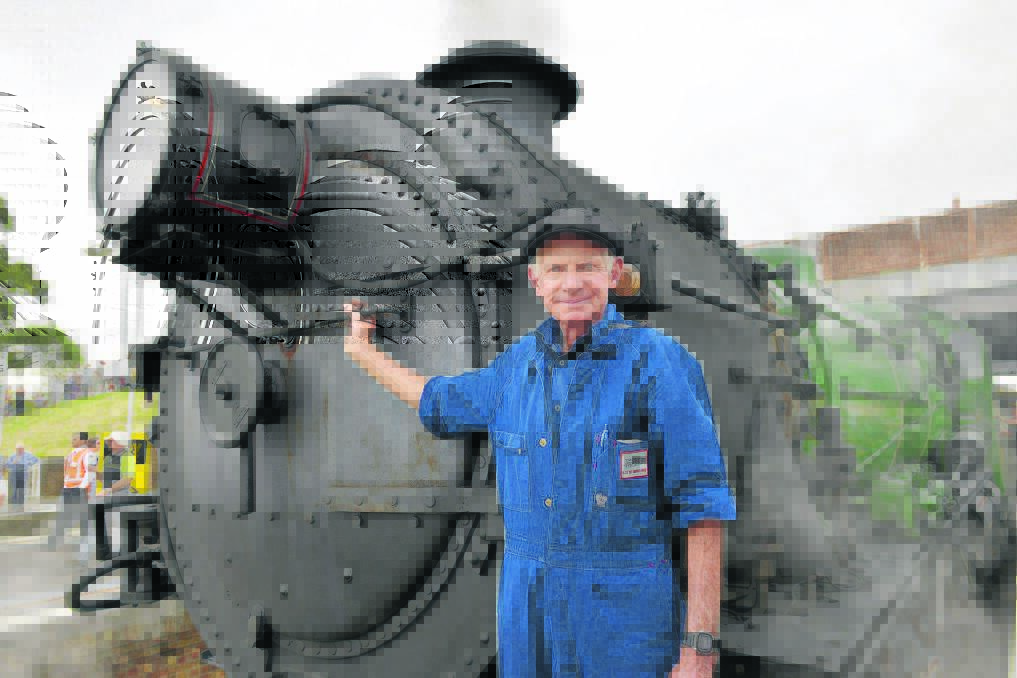 ALL SMILES:  The 3642 driver Bobby Donovan has been driving trains for 57 years, at Steamfest on Saturday.  	Picture by STUART SCOTT 