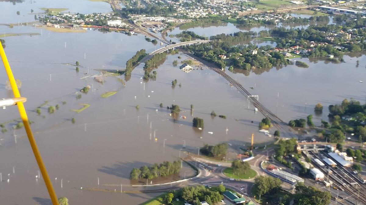 CUT OFF: The New England Highway at Maitland was cut for more than a week by floodwater last month.