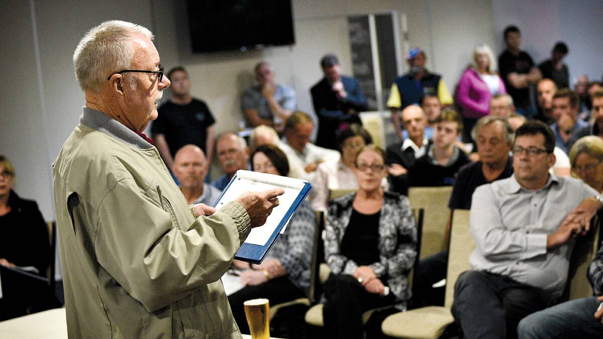 CONCERN: Geoff Purcell of Louth Park addresses almost 150 other residents concerned with the proposed development of a prayer room in their suburb. Picture by PERRY DUFFIN 