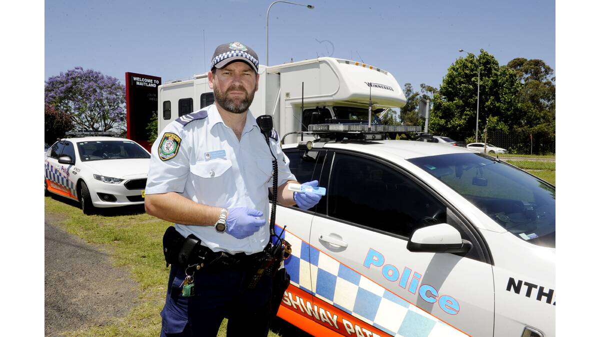 SCREEN TEST:  Senior Constable Daniel Kozaczynski at the drug bus at Maitland Visitors Centre.  	Picture by CATH BOWEN