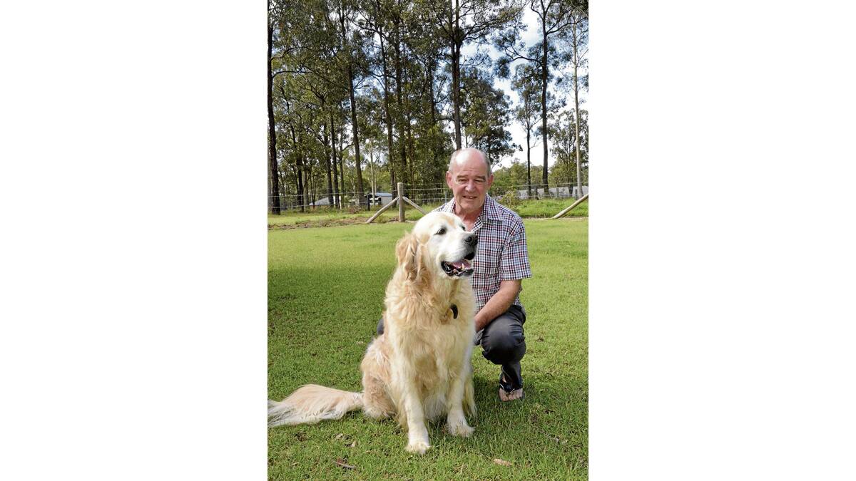ENOUGH IS ENOUGH:  Weston resident Paul Quirk and his dog Rufus, who has been disturbed by recent fireworks.