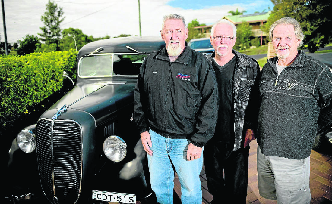 CELEBRATION:  Noel McTaggart, Dave Whan and Ron Alexander with Noel’s pick-up truck. Picture by PERRY DUFFIN
