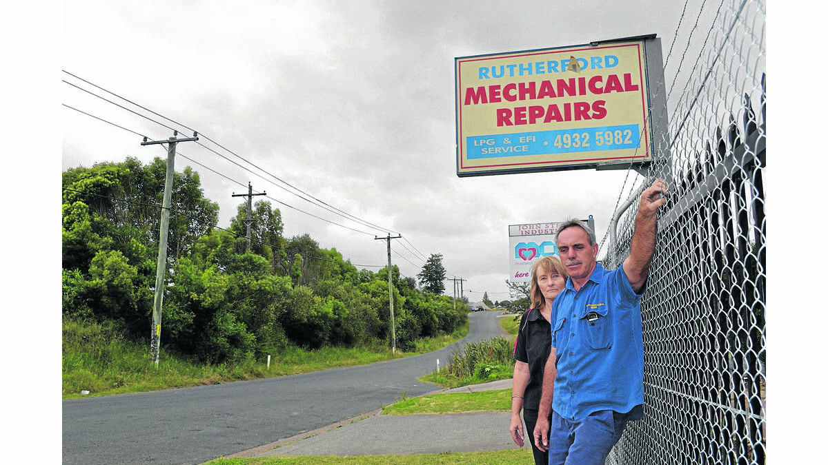 OPEN FOR BUSINESS: Bronwyn and David Emmerson outside their Rutherford business which as finally reopened after the devastation of the April super storm.