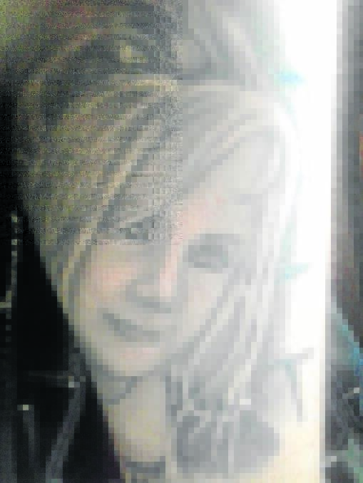 Tracey Evans' tattoo of her late sister Kelly.