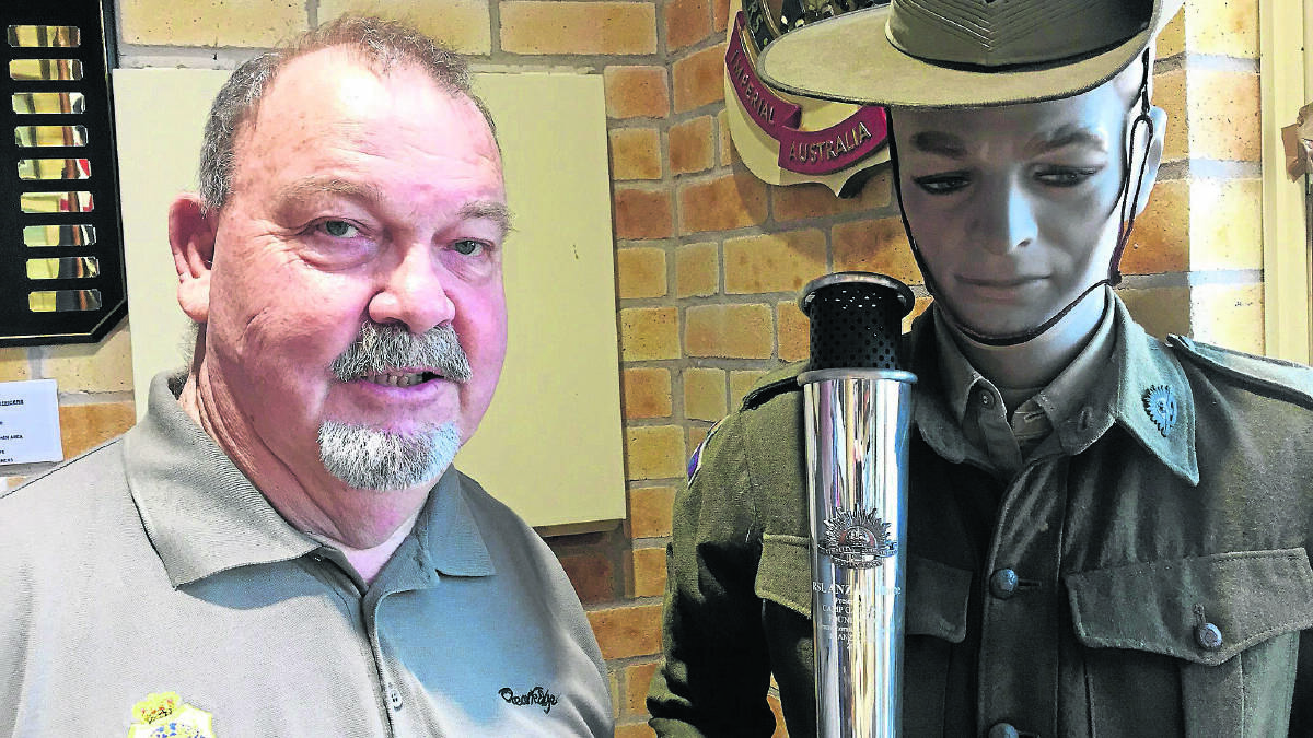 LANTERN:  Maitland RSL sub-branch president Eric Bell with the Gallipoli lantern. 	Picture by ALAN HARDIE
