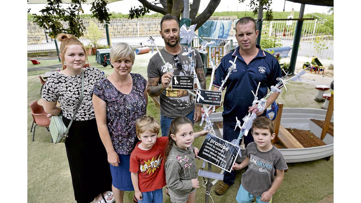 POWERFUL MESSAGE:  Georgia Gracie, Jo Smith, David Blackie and Andrew Hedges joined youngsters Vincent Williams, Sienna Blackie and Jake Hedges around the Maitland Community Preschool White Ribbon tree. 	Picture by STUART SCOTT