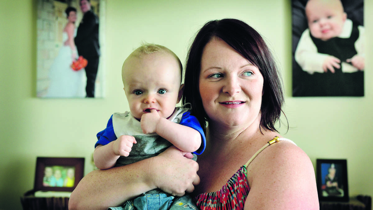 A LOSS IS A LOSS: Kristy Brown, who suffered three miscarriages, with her son Lawson.	Picture by CATH BOWEN 