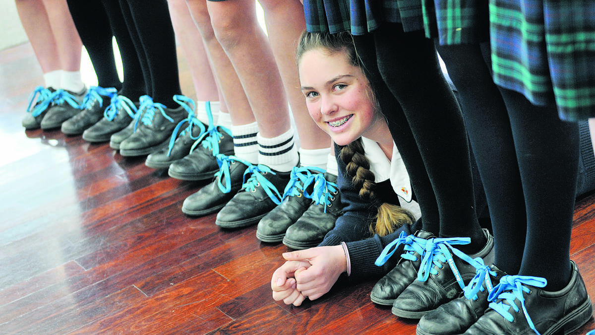 HELPING HOMELESS YOUTH:  Lyvia Pozywio with school friends who have joined the #laceitup campaign.  	Picture by CATH BOWEN 