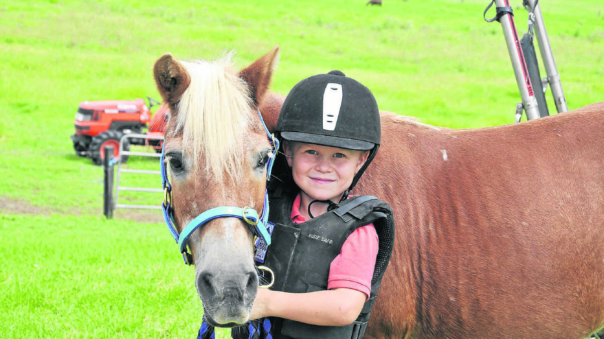 GRAND FINAL:  Charlie Odgers, 8, with his steed Falcon Crest.  	Picture by STUART SCOTT