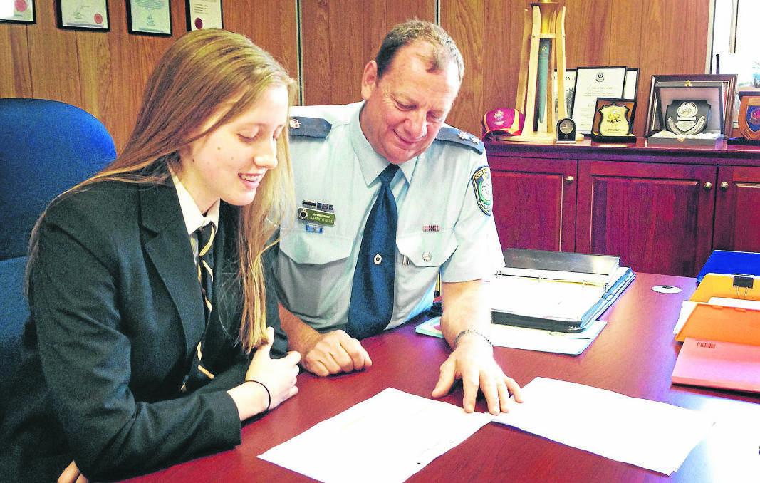 LEARNING CURVE:  Abigail Slater with Superintendent Garry O’Dell.   Picture by ANDREW PARKINSON