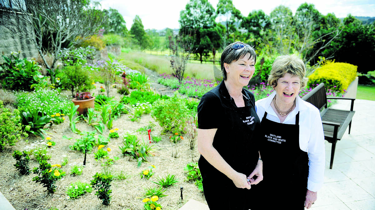 GREAT SUCCESS: Black and White president Ann Burns with Garden Ramble co-ordinator Lorraine Noonan.	Picture by CATH BOWEN 