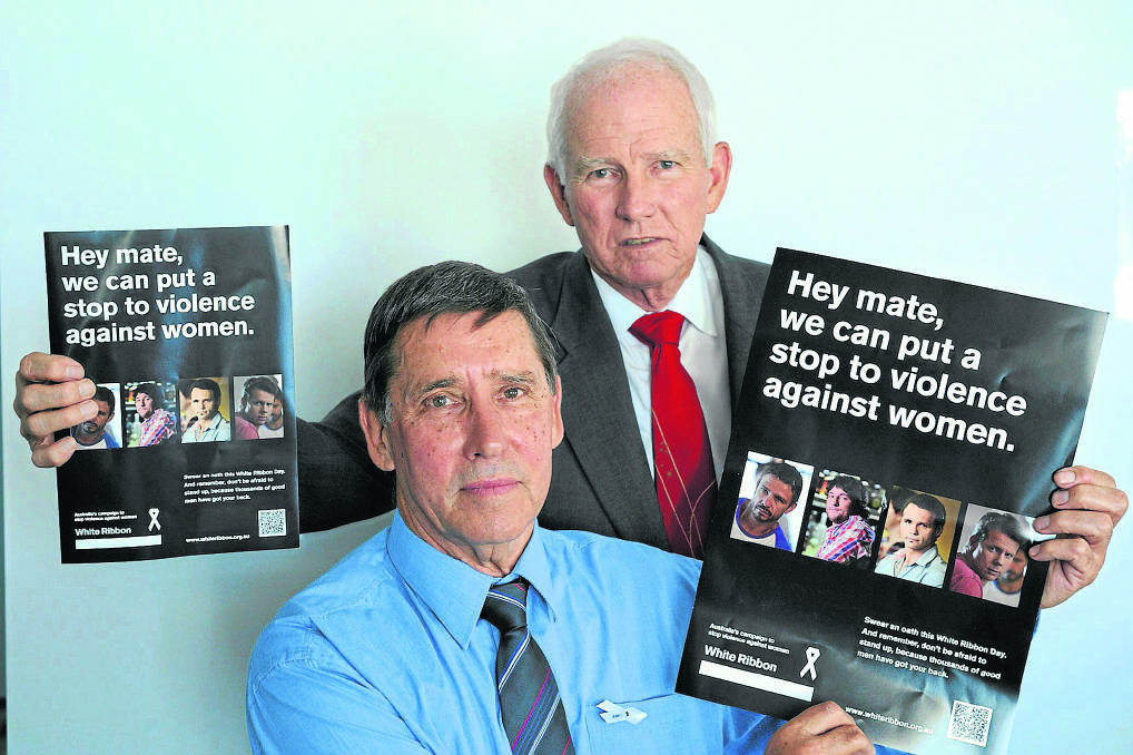 WHITE RIBBON REMINDER:  Maitland Rotary members Keith Pearson and George Williams.   	Picture by STUART SCOTT 