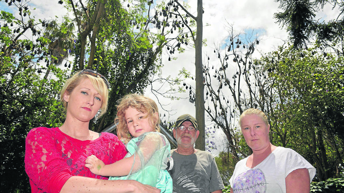 CONCERNS:  Maitland residents Danielle and Summer Griffiths, Len Chenery and Megan Carter who are all worried by the impact bats will have on the health of locals.  	Picture by STUART SCOTT 