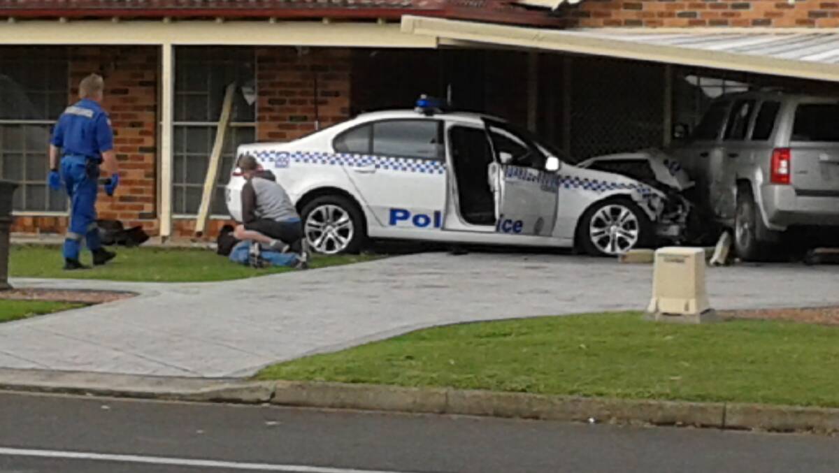 Handcuffed driver who allegedly crashed police car in Maitland court.