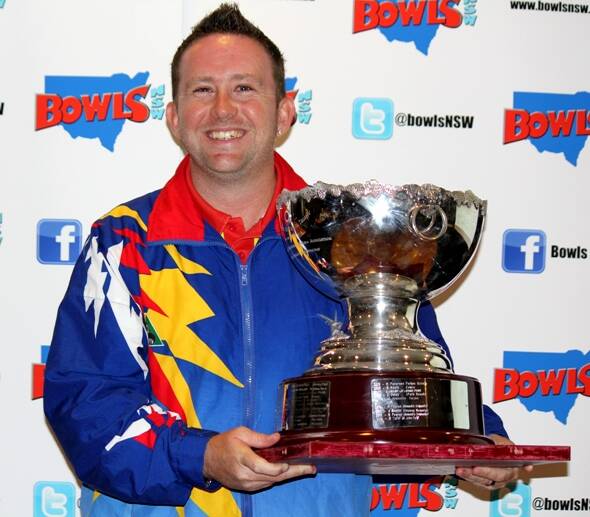Raymond Terrace Bowling Club member Lennon Scott with the silverware after winning the state singles final on Tuesday night. Picture courtesy of Bowls NSW.