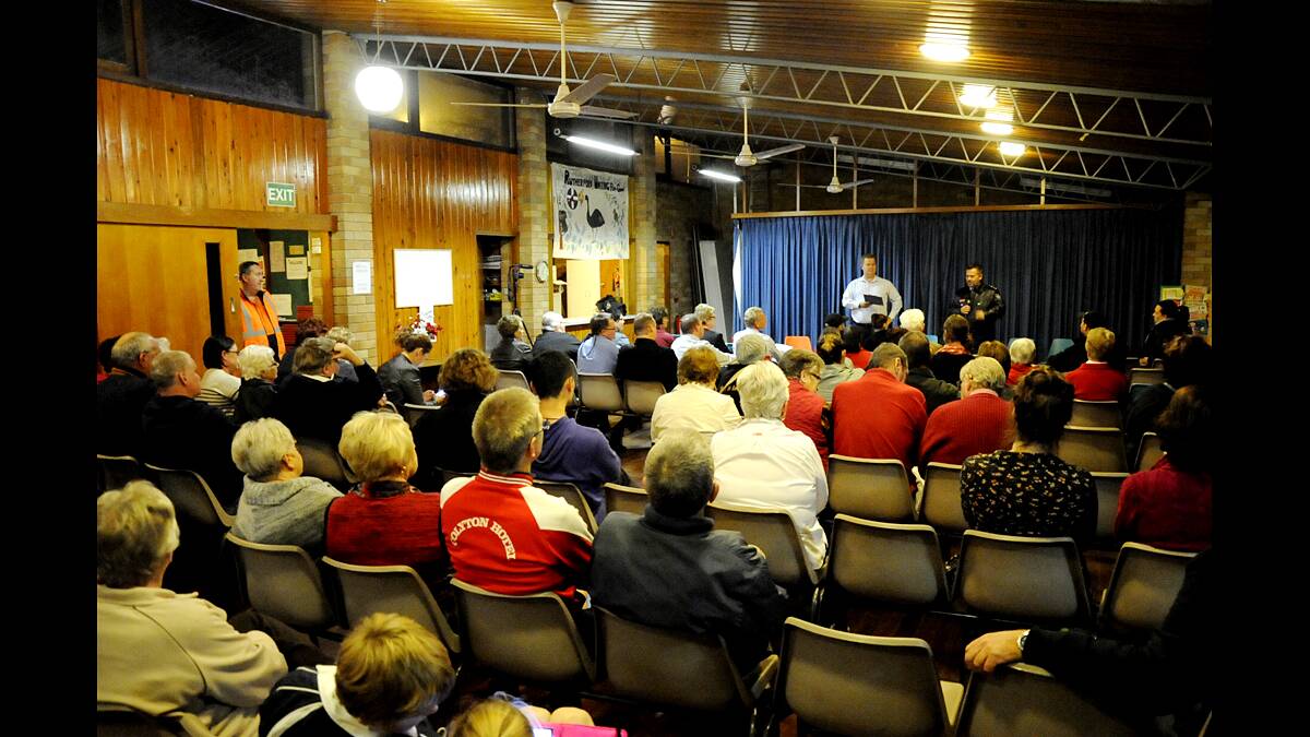 Cr Philip Penfold addresses the crowd at the Rutherford community forum on Thursday night. Picture by Perry Duffin.