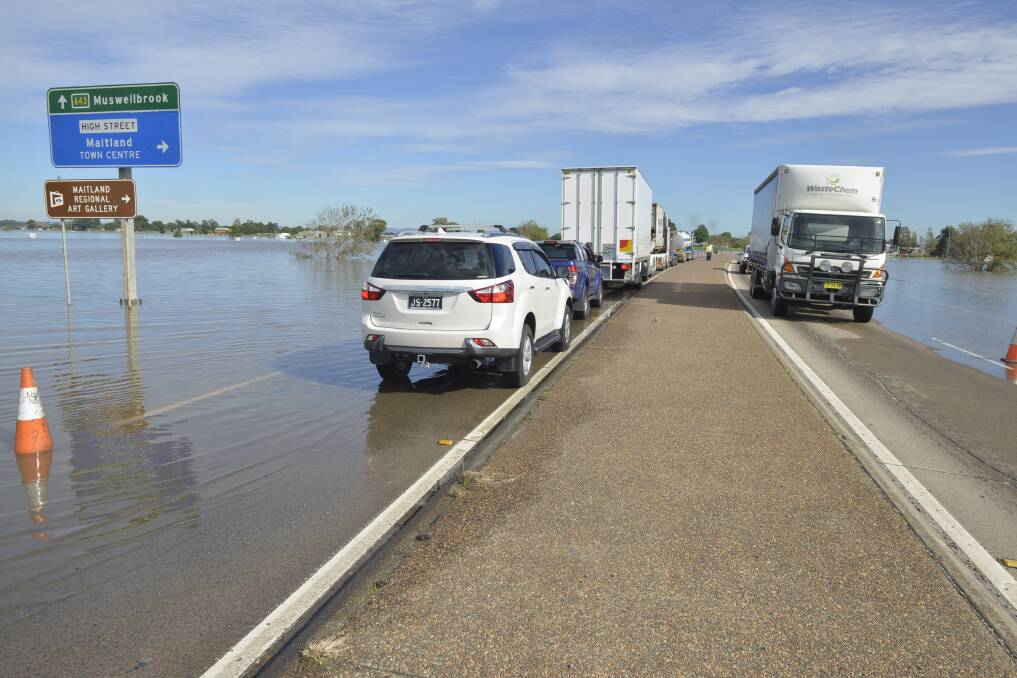 Floodwater around the Maitland Showground and low-lying farmland caused major disruption when it covered the New England Highway between Maitland and East Maitland.