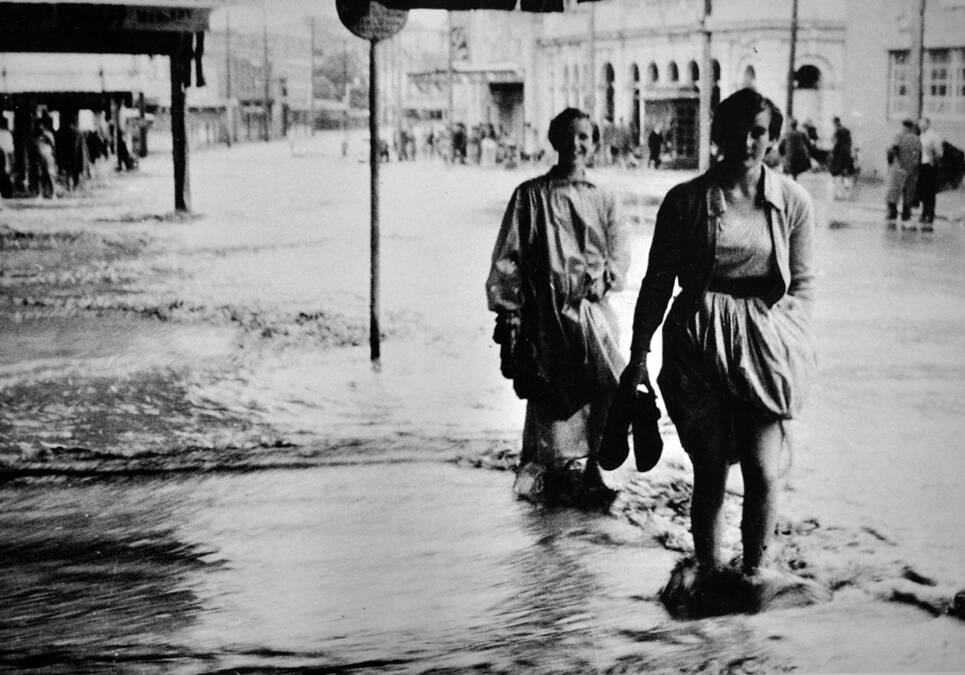 BENCHMARK TIME:  Scenes from the 1955 flood of Maitland.