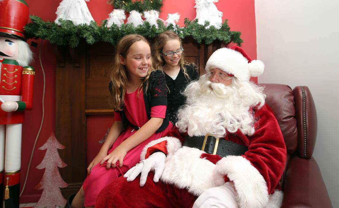 HAPPY TIMES:  Santa and his spirit of gift giving plays a key role in many people’s 
celebration of Christmas.  	