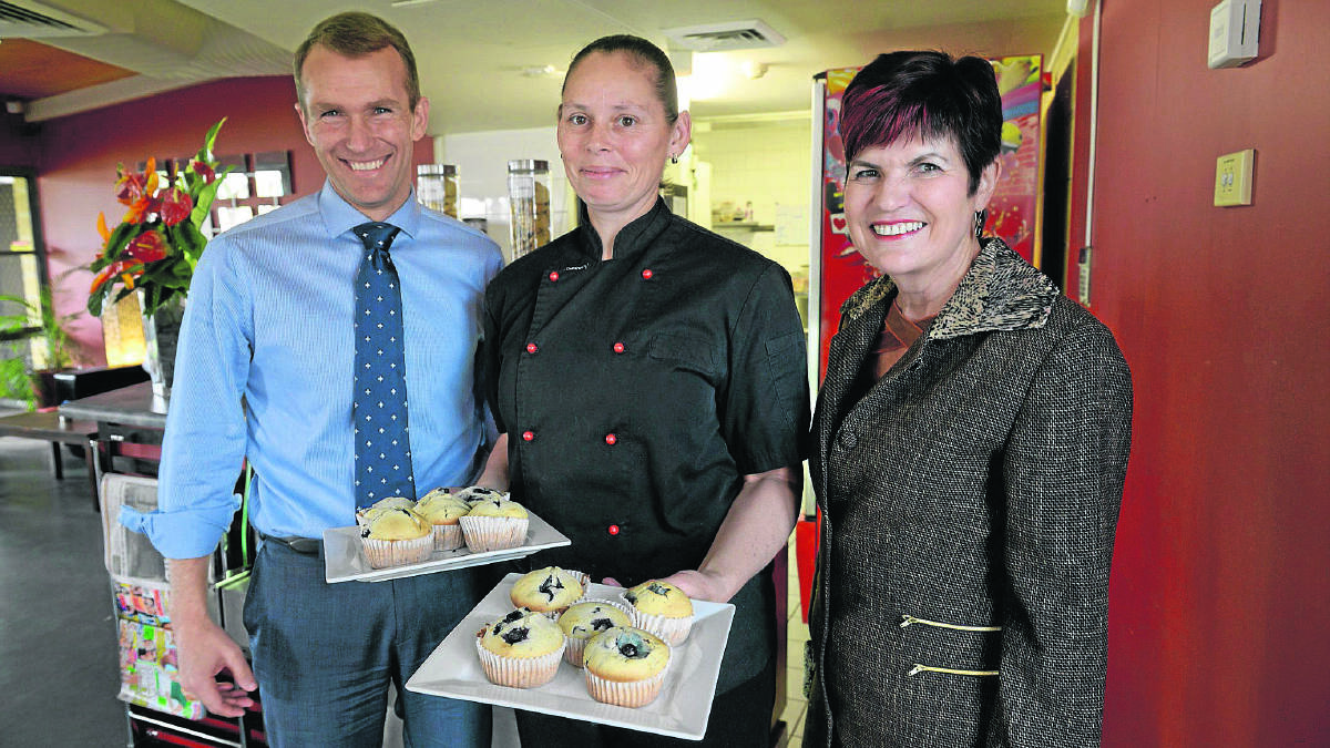 FOOD FOR THOUGHT: NSW Environment Minister Rob Stokes with Maitland MP Robyn Parker and Jayne Bright, owner of Central Park Cafe.   	Picture by STUART SCOTT 210814SS001