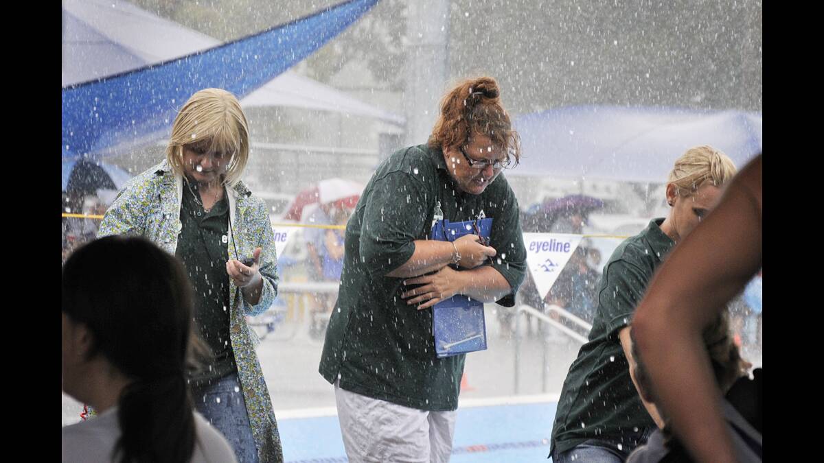 Rain? What rain? It didn't stop the action at the Regional Secondary Swimming Carnival in Maitland.