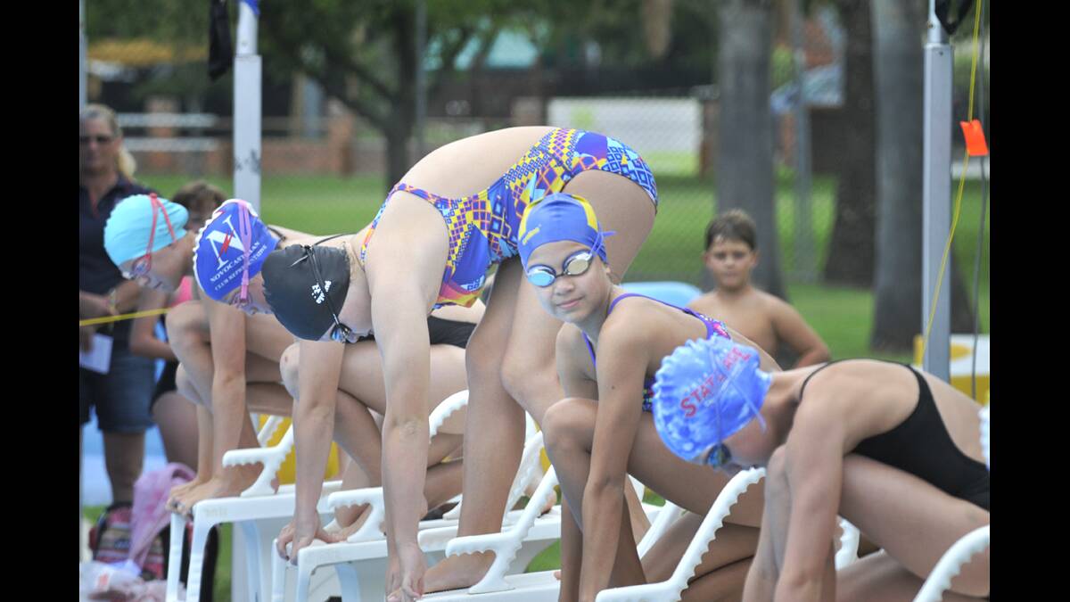Rain? What rain? It didn't stop the action at the Regional Secondary Swimming Carnival in Maitland.