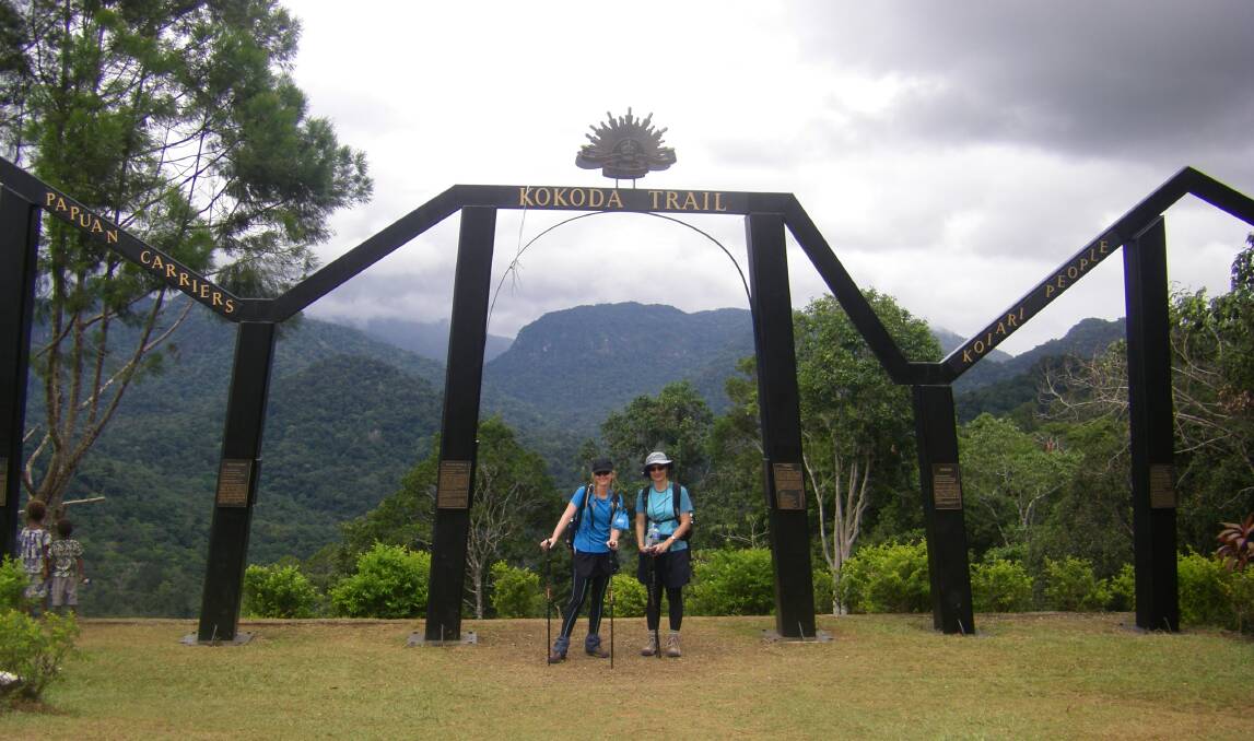 Loredana  Citraro, on the right, at the Kokoda Memorial Arch on her first trek of the Kokoda Track. PHOTO Loredana Citraro.