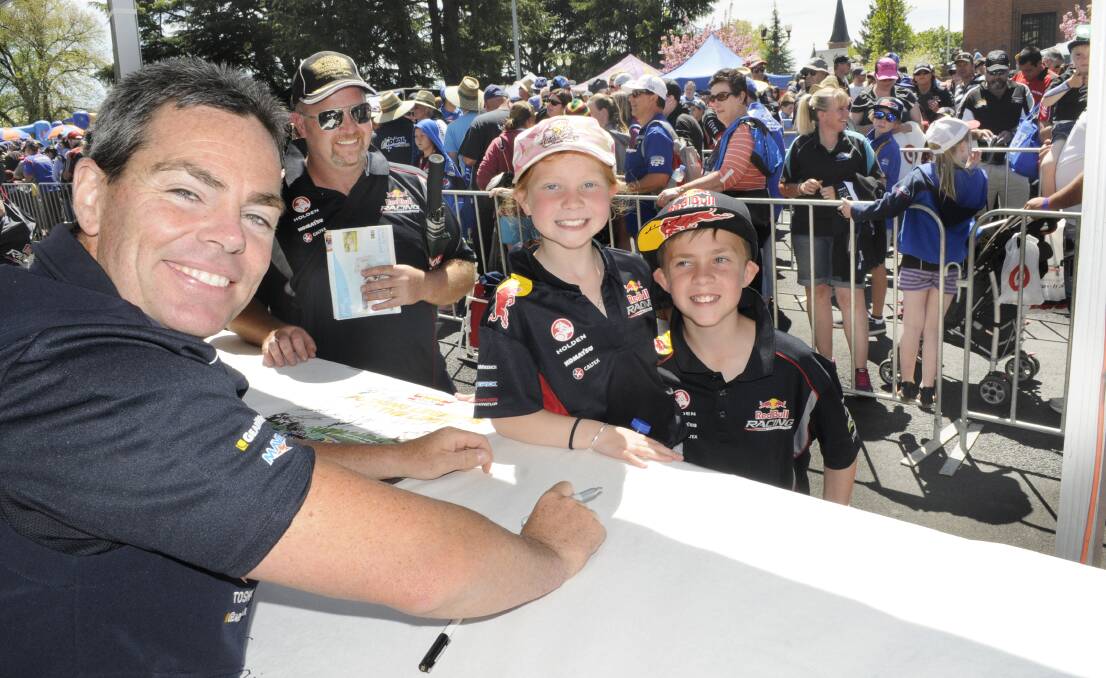 LEGEND: Craig Lowndes at the driver signing last year. Photo: CHRIS SEABROOK 100814craig