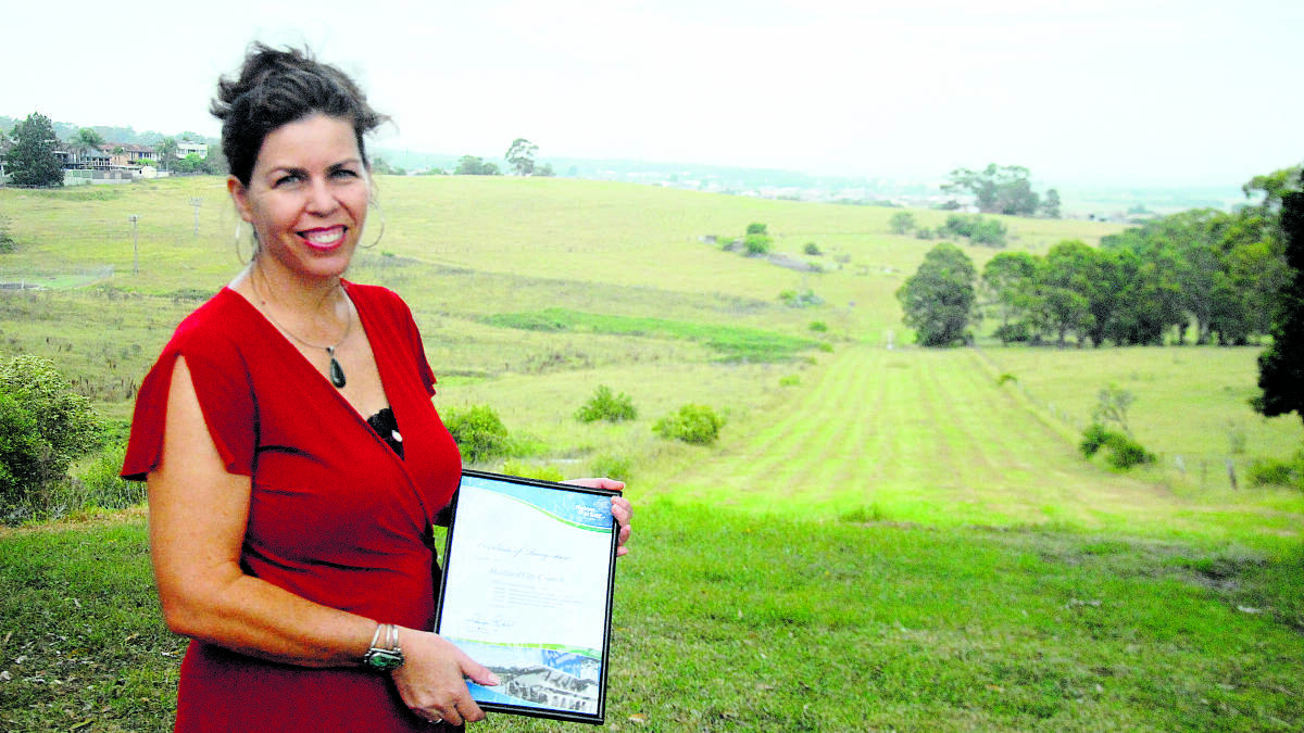 REASON TO SMILE:  Heritage officer Clare James says the additional heritage grants will go a long way to protecting ­important sites in Maitland, such as the Glebe Cemetery in East Maitland.