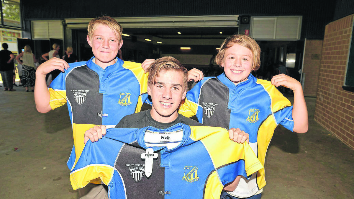 NEW JERSEYS: Maitland Blacks junior club captain Campbell Thomson with Bolwarra Public School students Aiden Webb and Clancy Newton.	Picture by STUART SCOTT