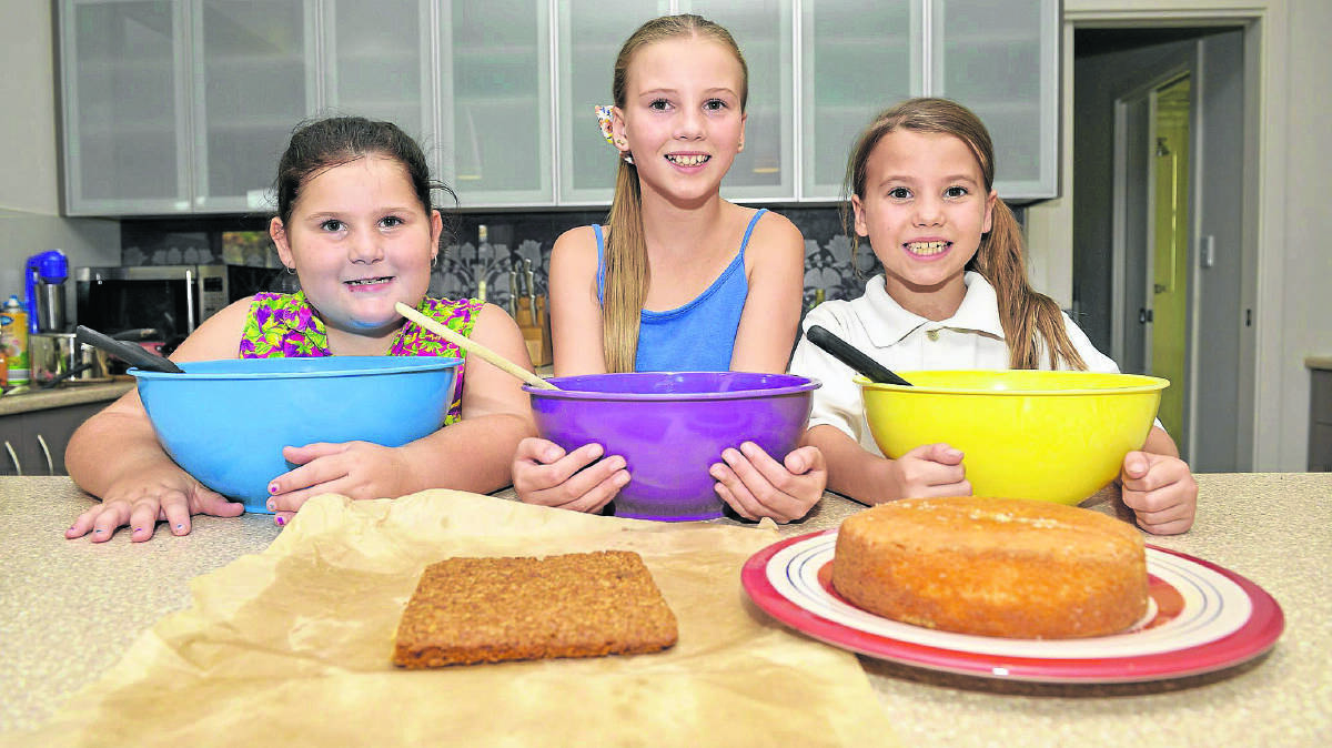 YOUNG COOKS: Nichola Baker, Tara Payne and Sienna Payne enjoyed success in the Maitland CWA cook-off.  	Picture by STUART SCOTT 200315SS011