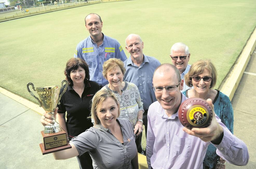 BOWLED OVER:  Tony Cant’s Trisha Saxby and Mai-Wel’s Anthony Rohr (front) look forward to the Bare Foot Bowls Cup. Among the event’s organisers and supporters is Suzanne Hamilton and David Grant (UltraFloor), as well as Maitland Sunrise Rotary president Kay Pritchard, Alan Morrison (UltraFloor), and Rotarians Trevor and Bev Holden.          
Picture by SAM NORRIS