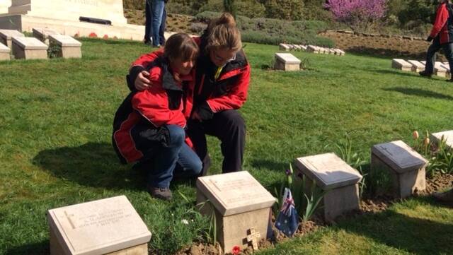 Hunter Region students and chaperones tour Redoubt Cemetery.