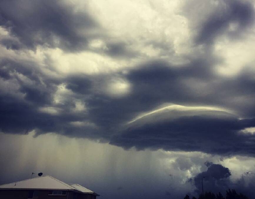 Crazy clouds over Gillieston Heights by Nic Holstein