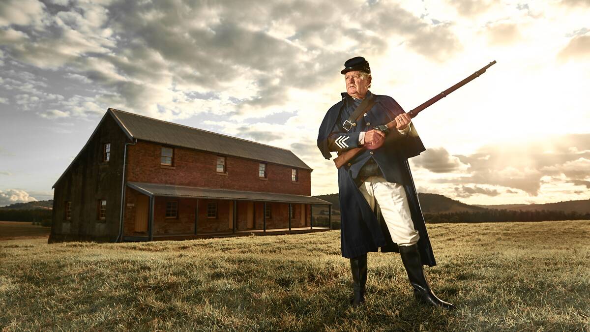 PEEK INTO THE PAST: Trooper Greg Powell, gun at the ready, will tell the story of bushranger Captain Thunderbolt. Picture PERRY DUFFIN