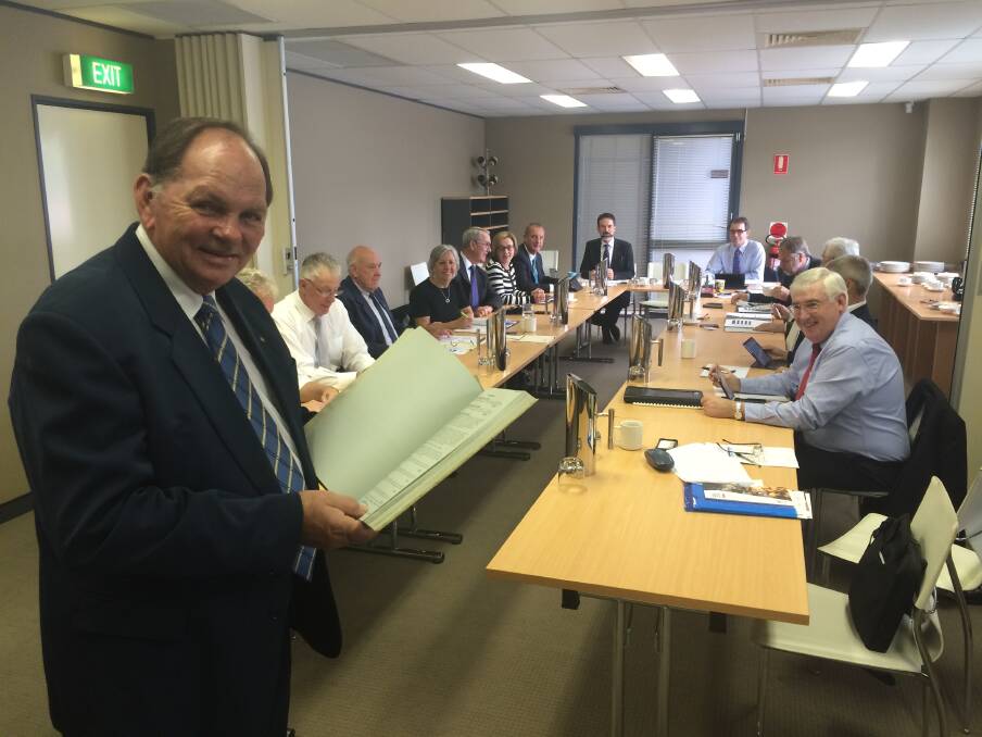 SUCCESSFUL TEAM:  Mayor of Maitland Peter Blackmore addresses the meeting of joint councils.  	Picture by NICK BIELBY