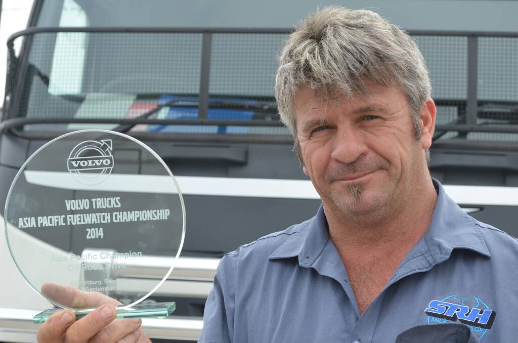 CHALLENGE: SRH Milk Haulage managing director Scott Harvey with his Asian Pacific Volvo Fuel Challenge Championship trophy.