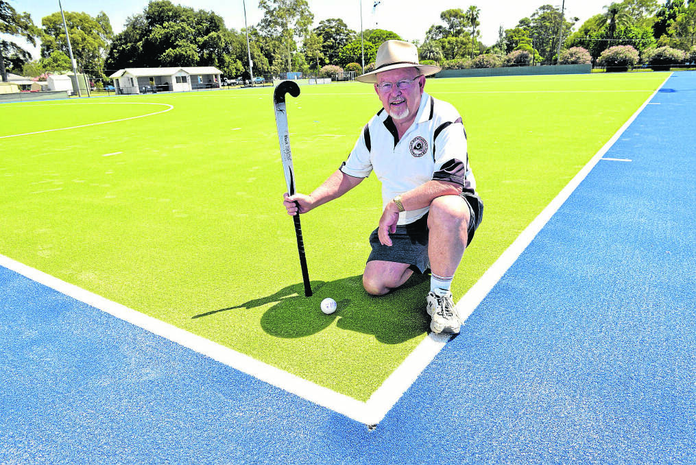 GOOD AS NEW:  Kevin Short on the repaired hockey field surface.
Picture by STUART SCOTT