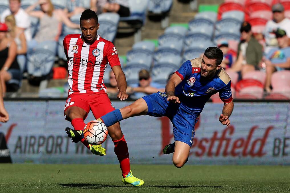 UPSET WIN: Newcastle Jets player Jason Hoffman competes for the ball.