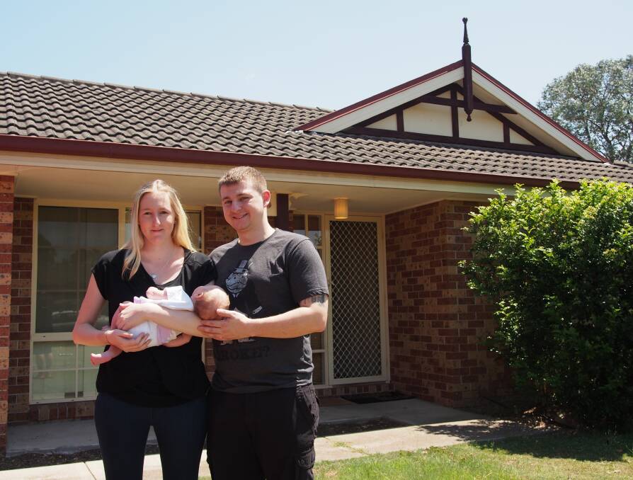 New home: Ashley Wilton and Allan Shaw with their baby Ava. Picture: Nick Bielby