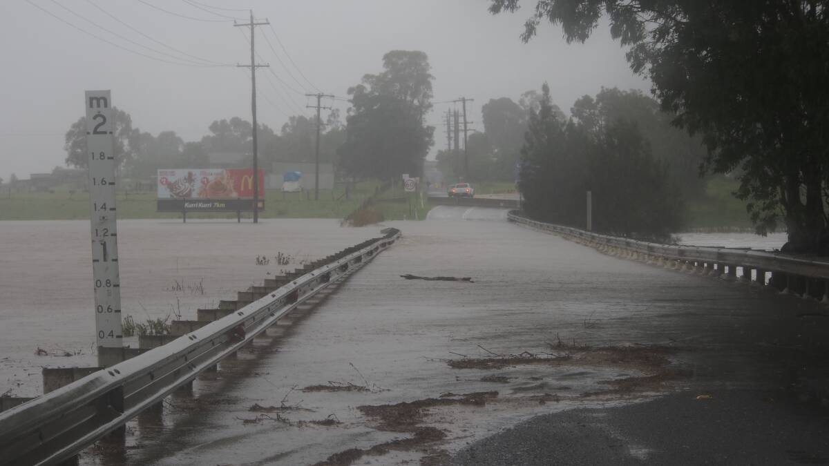 Inundated: Cessnock Road at Testers Hollow after heavy rain in January, 2016. Picture: Nick Bielby