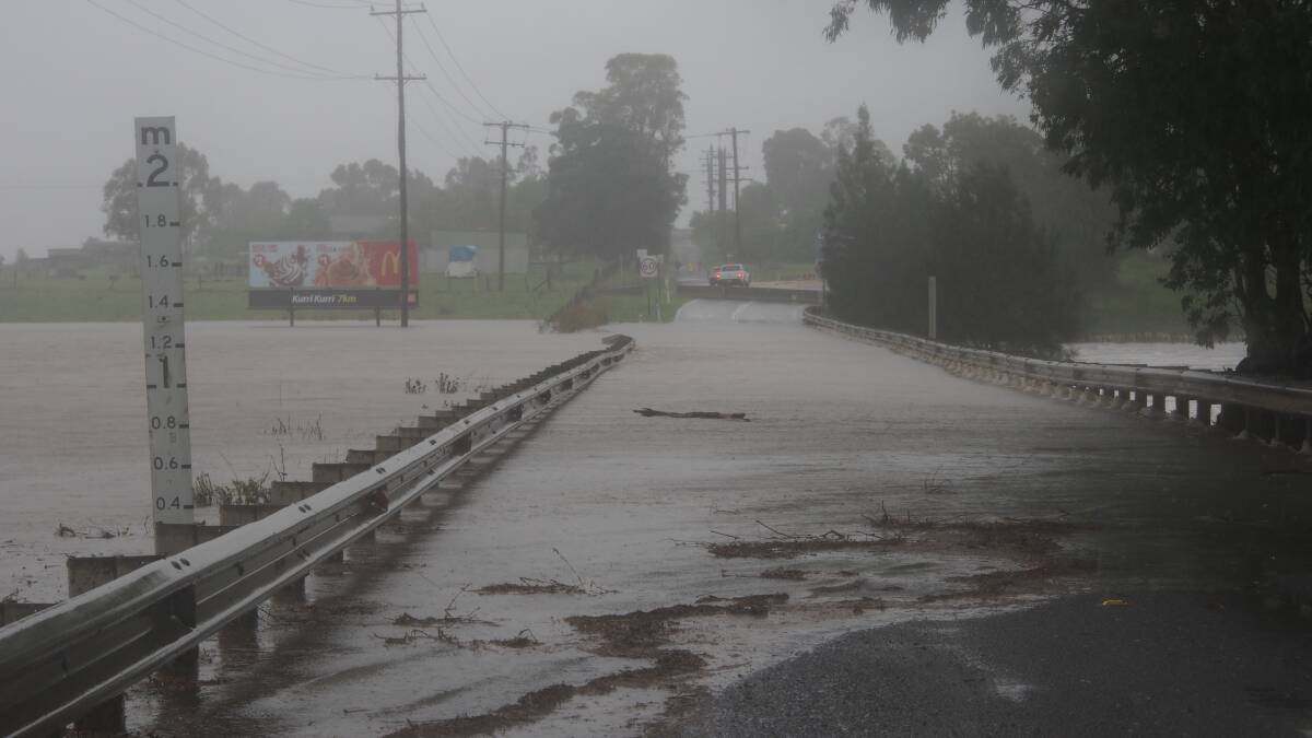 Cessnock Road under floodwater at Testers Hollow in January, 2016. Picture: Nick Bielby