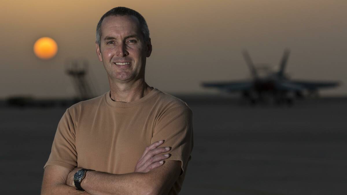 Royal Australian Air Force Avionics Technician Sergeant Peter Knezevic on the flight line at sunset during his Operation OKRA deployment at the main air operating base in the Middle East Region. Picture: Supplied