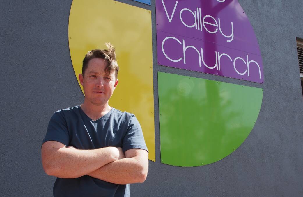 Solution: Hope Valley Church senior pastor Luke Main in Cessnock after his facility's air conditioning broke in November. Picture: Nick Bielby