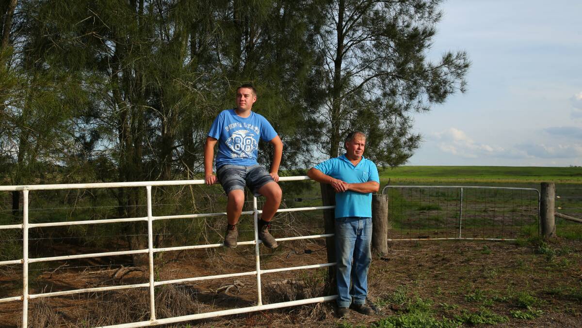 FLOOD EXPERIENCE: Nelson Plains’ farmer Peter Manuel and his son Michael, 15, saved their cattle by swimming them to higher ground. Picture: Simone De Peak