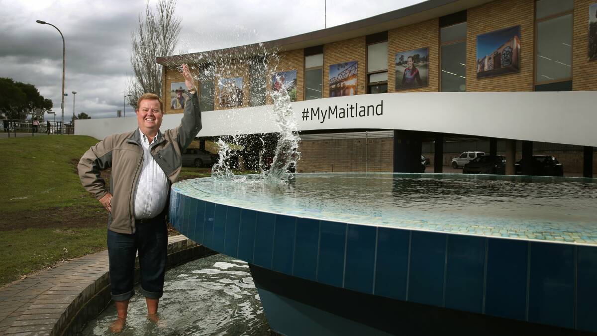RESTORED: Cr Philip Penfold with the Maitland Library fountain. Picture: Marina Neil