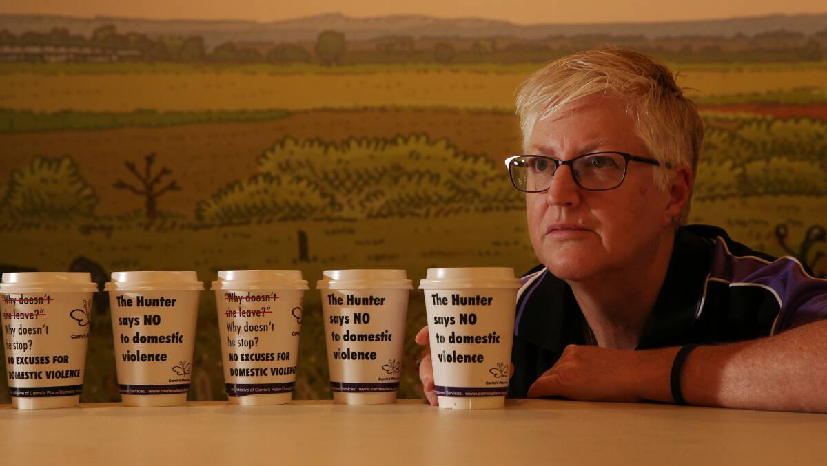 TAKEAWAY: Jan McDonald, CEO of domestic violence service Carrie’s Place, with the coffee cups. Picture: Simone De Peak