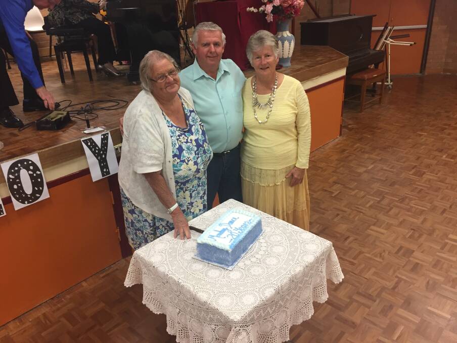 Celebration: Maitland Senior Citizens Association members Mary Holt, Greg Parsons and Kathy Parsons. 