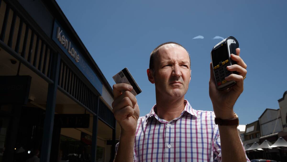 Frustration: Patrick Lane, of Ken Lane Menswear, has been affected by the EFTPOS outage. Picture: Max Mason-Hubers
