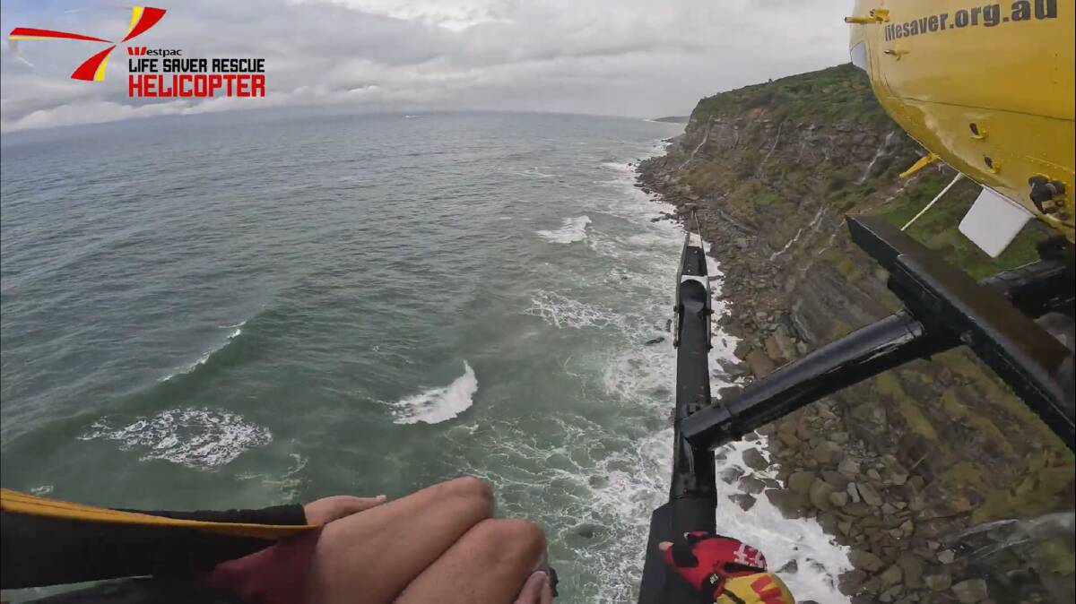 Adam Hansen was rescued from rock ledges at Otford on Wednesday, May 8 after a fishing trip went wrong the day before. Pictures by Westpac Rescue Helicopter